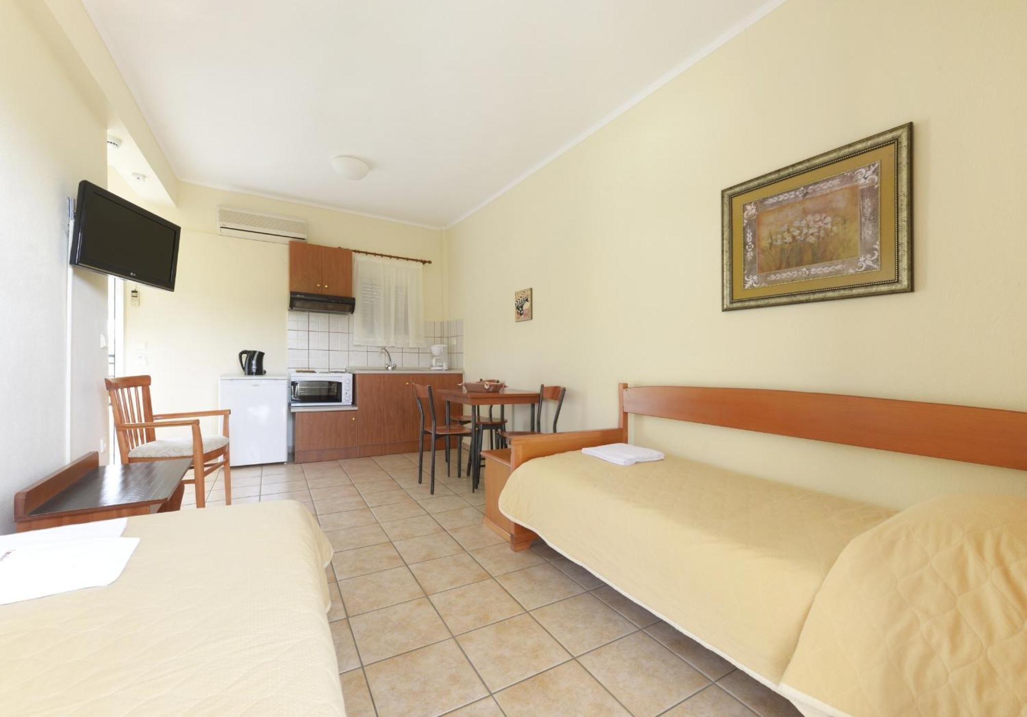 Amalia Aparthotel PalaiónTsiflíkion Rum bild